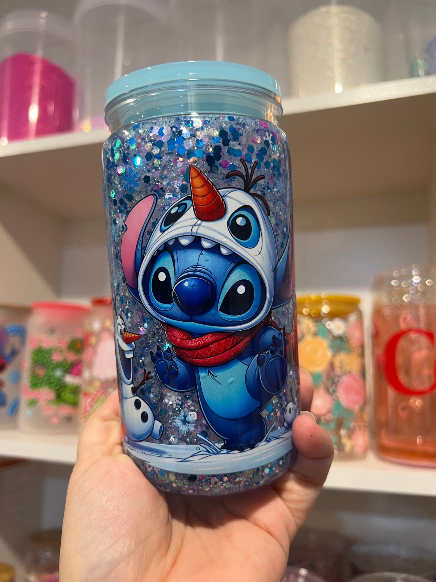 Blue guy and snowman Christmas Snow Globe Tumbler – 16oz Glitter Edition