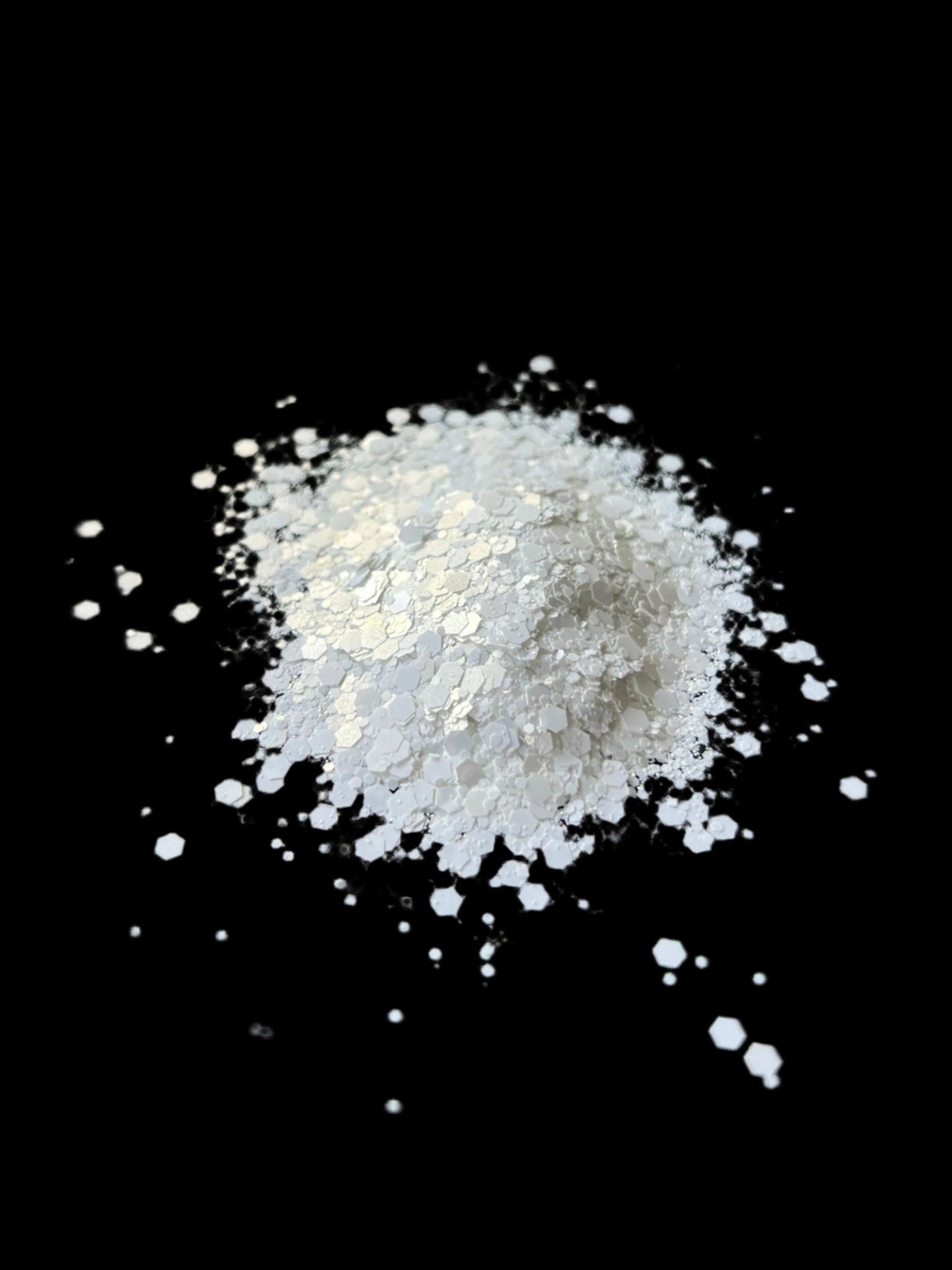 White powder on a black surface