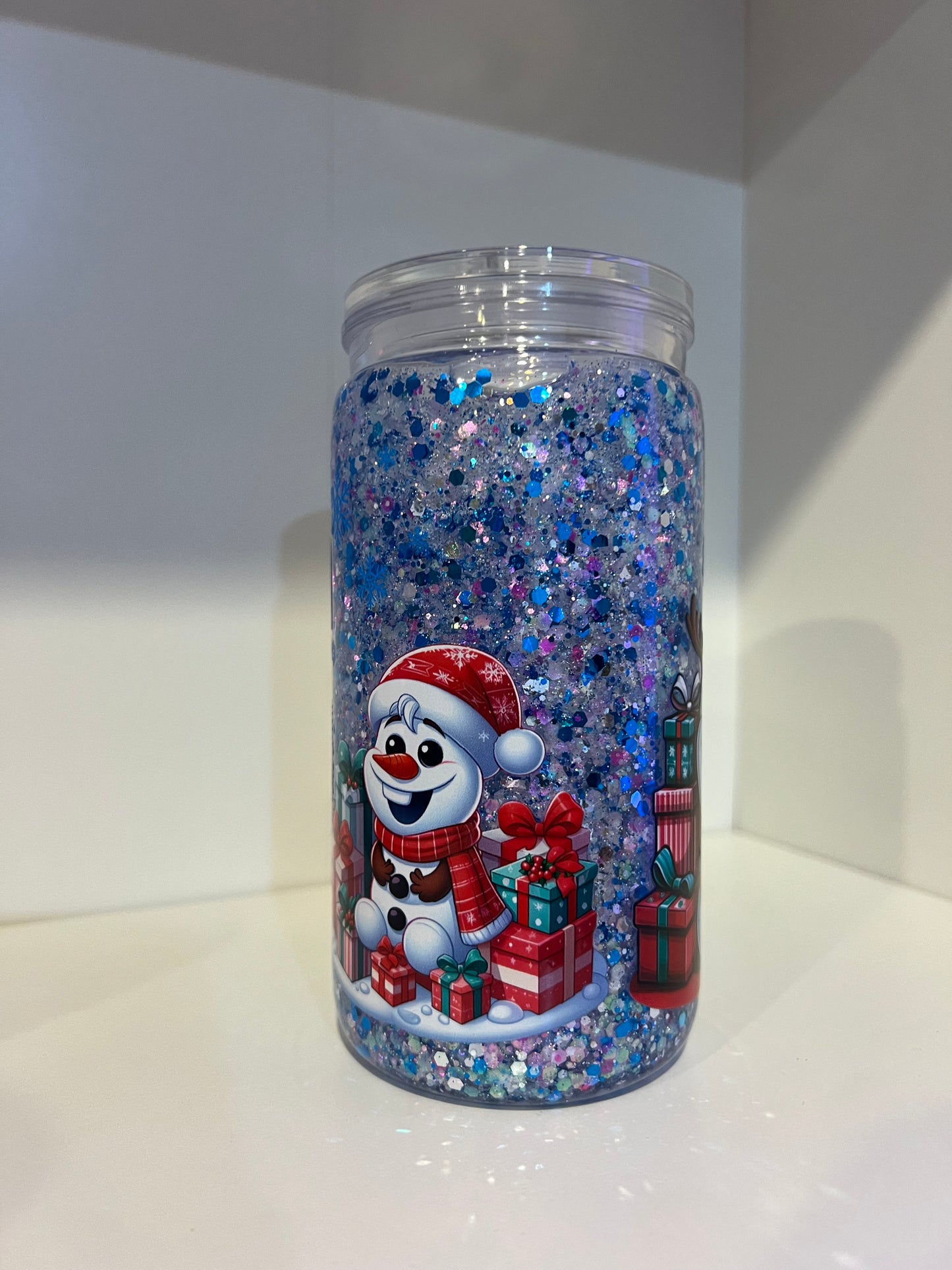 Blue guy and snowman Christmas Snow Globe Tumbler – 16oz Glitter Edition